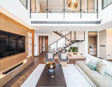 Zabeel One staircase with contemporary seating area